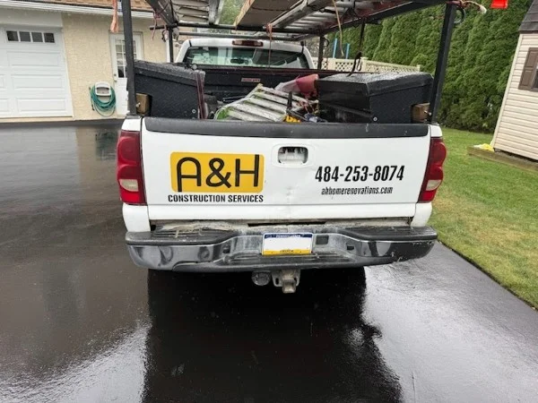 Rear view of the A&H Home Renovations truck