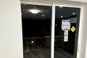 A newly built screen porch from the inside of a house